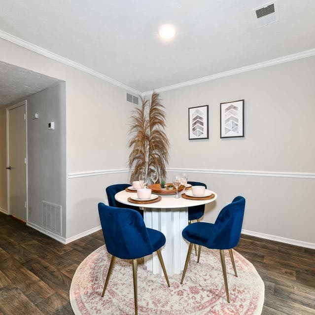 The Preserve at Dunwoody - Round Dining Table With Blue Seats