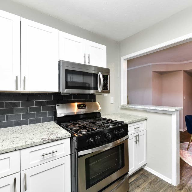 The Preserve at Dunwoody - Kitchen Leading to Dining Table